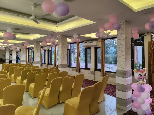 Banquet hall decorated with balloons for a birthday celebration